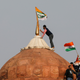 Protestors waving flags at the Red Fort on Jan. 26.